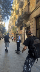 Ordinary Barcelona street life documented during sunny afternoon