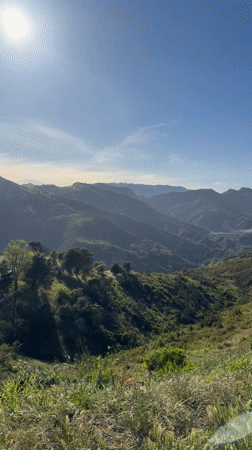 Clear skies over green Los Angeles mountains captured on video
