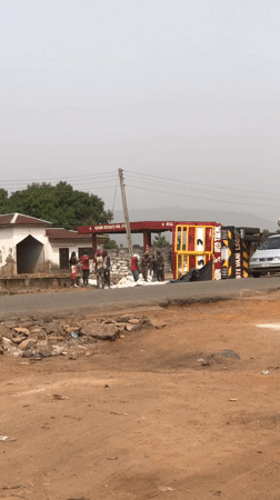 Truck overturns on dusty road in Karshi, Nigeria