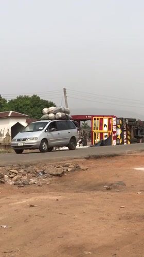 Truck overturns on dusty road in Karshi, Nigeria
