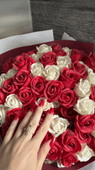 Woman documents selfies and wedding moments with rose bouquets