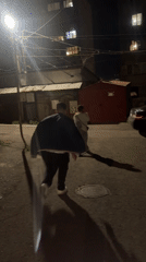 Nighttime pedestrian activity documented in Yerevan street alleyway