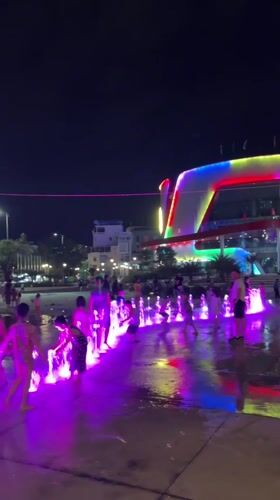 Nha Trang's colorful waterfront fountain draws a crowd after dark