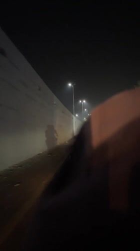 Evening traffic flows normally through Lahore roads and underpass