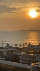 Pattaya coastline captured from elevated views during day and sunset