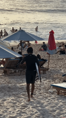 A laid-back beach day with surfers, cliffs, and golden-hour vibes.