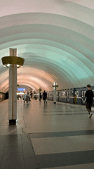 Colorful Narvskaya Metro Station Captured by Morning Commuters