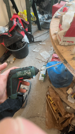 Person holds cordless drill in Burgas, Bulgaria
