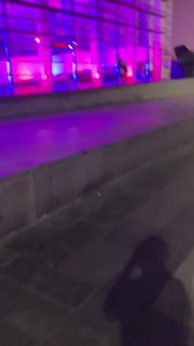 MACBA glows in pink and purple light on a Barcelona night