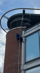 Norwich city scenes documented including cathedral, memorial, abseiling activity