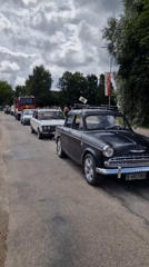 Classic cars, military vehicles, and crowd scenes in Priekule, Latvia