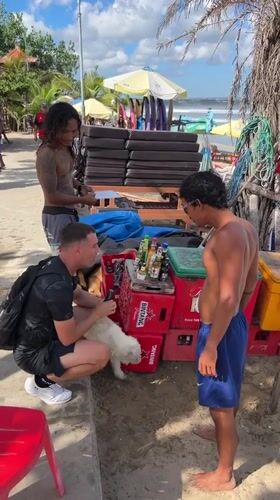 Kuta Beach in full swing — surf, vendors, and beachfront hangouts