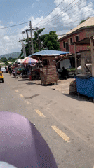 Street scenes captured along Lokoja roads during midday