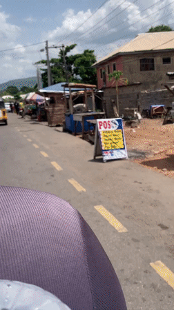 Street scenes captured along Lokoja roads during midday