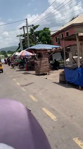 Street scenes captured along Lokoja roads during midday