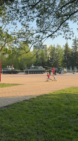 Woman documents Ferris wheel ride over Russian city park
