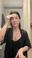 Woman tries on clothes, takes selfies in Perm apartment