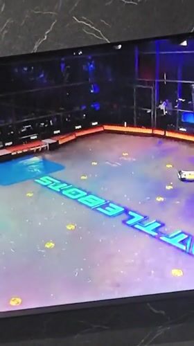 BattleBots matches playing on a TV in Amursk