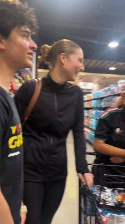 Casual moment in a store aisle in Tlaxcalancingo