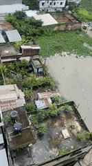 Urban flooding submerges streets and alleys across Dhaka