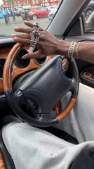 Driver spotted wearing jewelry while operating vehicle in London