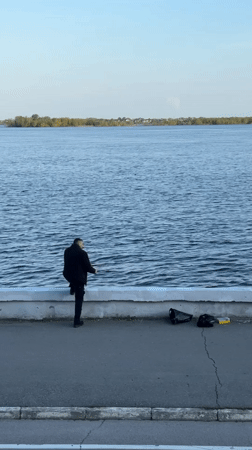 Angler fishes from Volga River embankment in Saratov