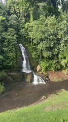 Waterfall and bronze sculptures documented in Blahbatuh, Indonesia
