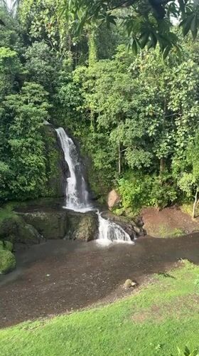 Waterfall and bronze sculptures documented in Blahbatuh, Indonesia
