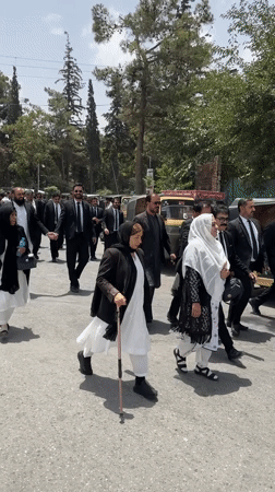 Lawyers and judges march through Quetta in formal procession