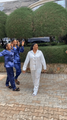 Women pose in matching pajamas for photo shoot Nigeria