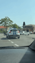 Police SUV with flashing lights spotted at Montenegro intersection