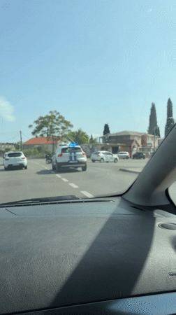 Police SUV with flashing lights spotted at Montenegro intersection