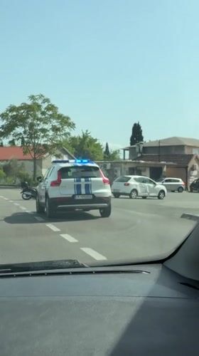 Police SUV with flashing lights spotted at Montenegro intersection