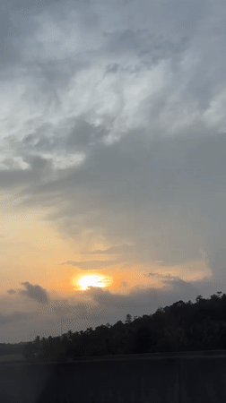 Sunset captured from highway vehicle near Galaboda, Sri Lanka