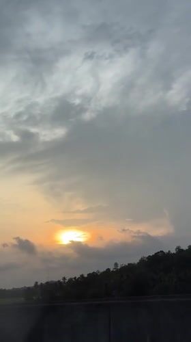 Sunset captured from highway vehicle near Galaboda, Sri Lanka