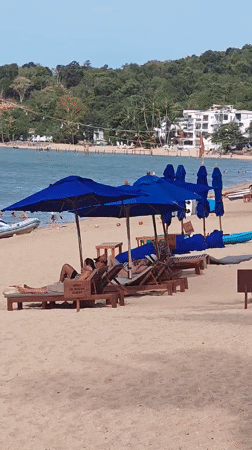 Ko Samui beach morning with inflatables, boats, and resort vibes