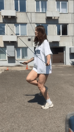 Woman exercises outdoors in Krasnoyarsk on sunny morning