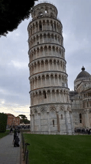 Tourist captures standard view of Leaning Tower of Pisa