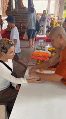 Blessing rituals and a mummified monk at Ko Samui temple