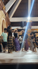 Children perform traditional Balinese dance with gamelan in Sukawati
