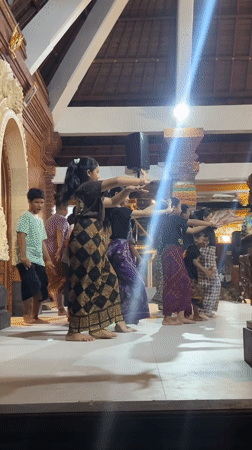 Children perform traditional Balinese dance with gamelan in Sukawati