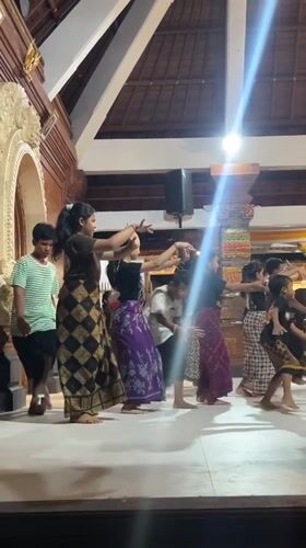 Children perform traditional Balinese dance with gamelan in Sukawati