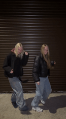 Young women document nighttime rural exploration in Zhigalki, Russia