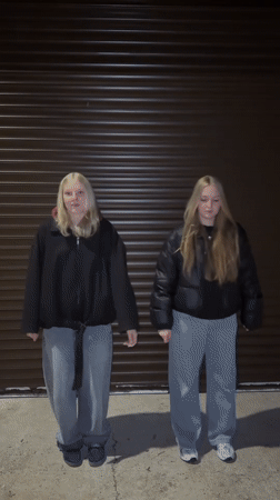 Young women document nighttime rural exploration in Zhigalki, Russia