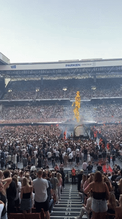 Sold-out stadium concert at Parken features golden statue and pyrotechnics