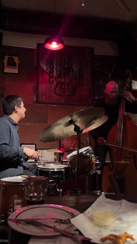 Jazz performance and art viewing captured in Yerevan