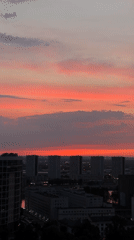 Sunset time-lapse paints the sky over a Russian city