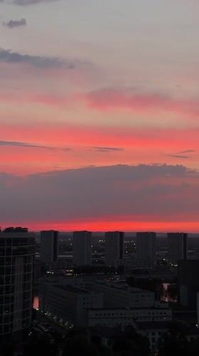Sunset time-lapse paints the sky over a Russian city