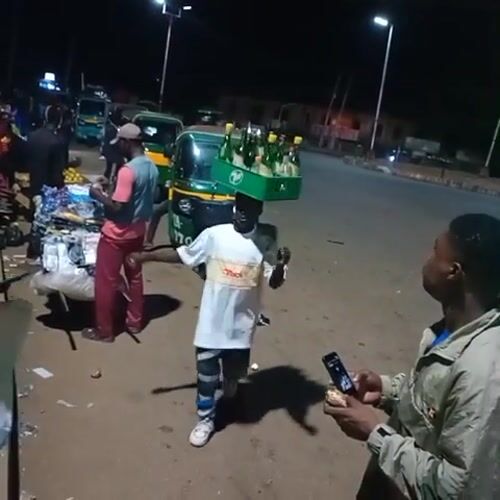 Nighttime street life documented in Bukuru, Nigeria marketplace district
