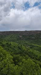 Tourist documents Armenian valley monasteries and landscapes near Kurtan